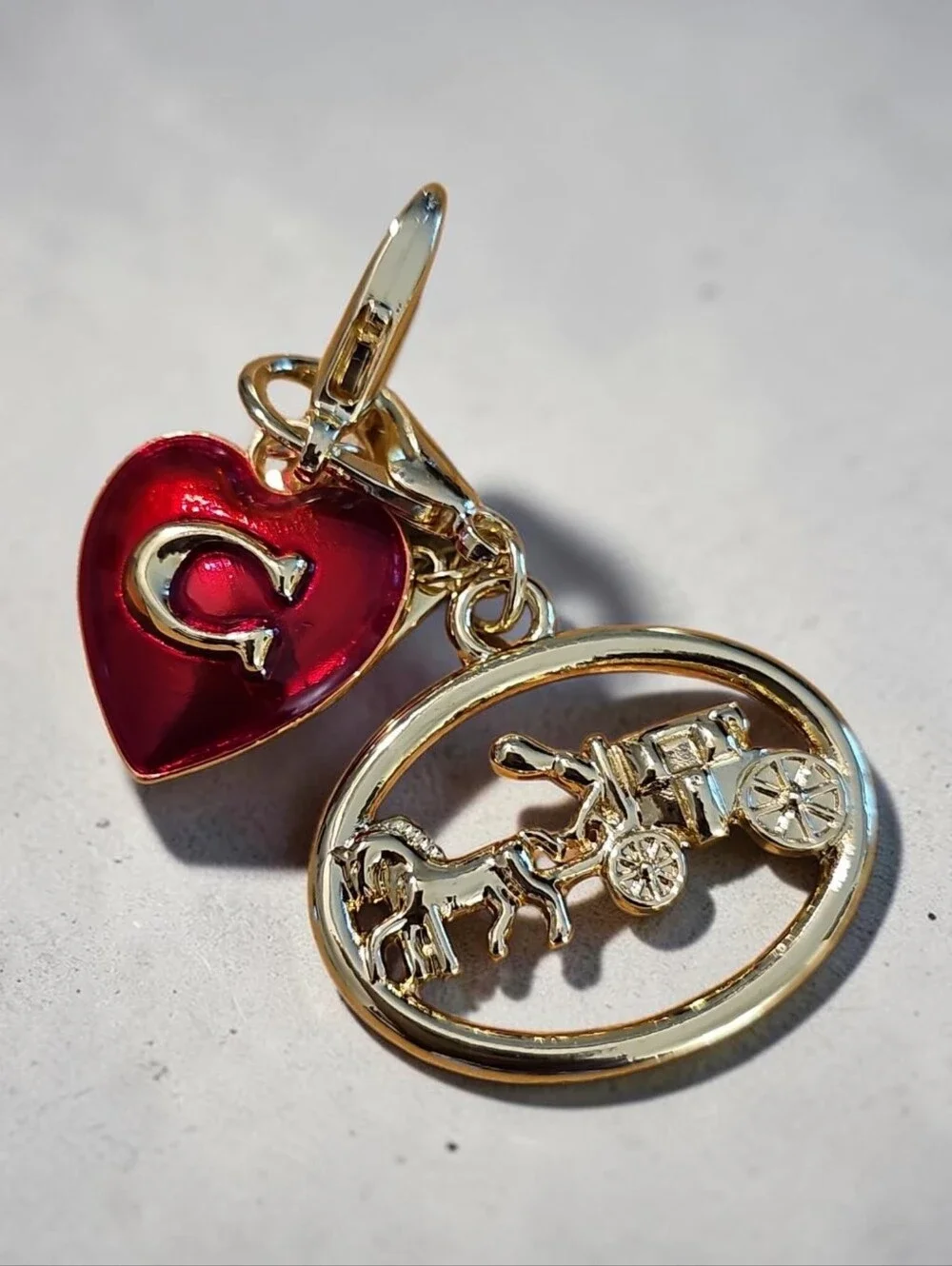 SASSIFIED  BOUTIQUE Nwt Gold Carriage Charm with Red Heart Tag